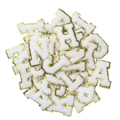 Iron-On bokstaver, hvite med gullglitter, 40 stk. A–Z, lengde 6 cm