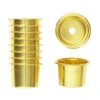 Lyshylser, messingfarget. Ø23 mm, H 20 mm (antikklys), fremstilt i aluminium