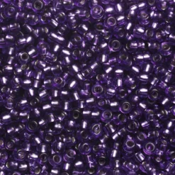 Rocaillesperle 9/0 Lilla halvt