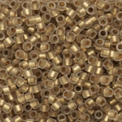 TOHO-perler 11/0 – gull transparent matt, 989FM Frosted gold-lined crystal